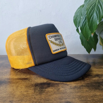Vintage American Trucker Hat Snapback cap one size adjustable black yellow champion feed services