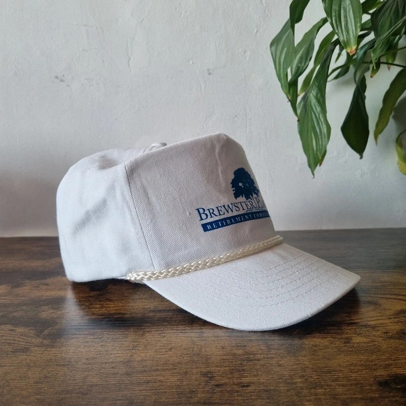 Vintage American Trucker Hat Snapback cap one size white brewester place retirement community