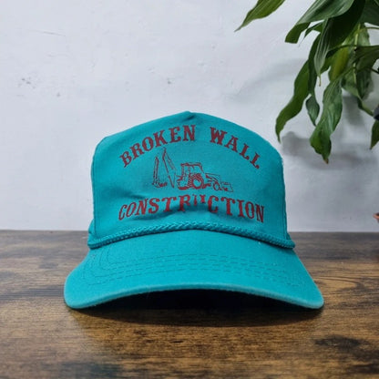 Vintage American Trucker Hat Snapback cap one size adjustable green broken wall construction